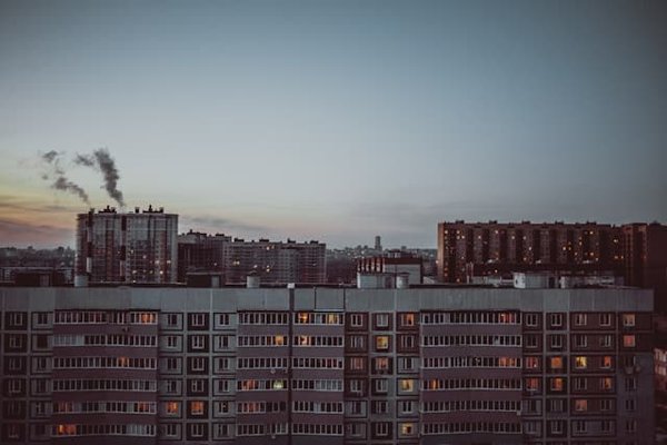 What strategies can be employed for energy retrofitting in aging real estate assets?